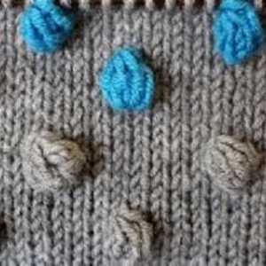Tricotăm modelul "butoanelor" cu ace de tricotat