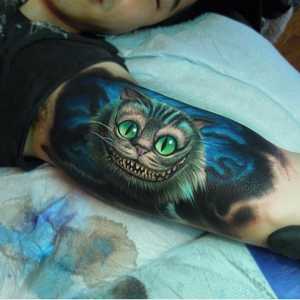 `Cheshire Cat` - tatuaj cu sens pozitiv pentru oamenii optimisti