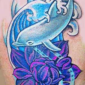 `Dolphin` - un tatuaj cu un sens. Ce înseamnă asta?