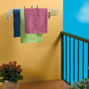Uscător de haine pe peretele balconului: avantaje, caracteristici alese și aplicații